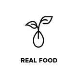 Icon of a macadamia nut with two leaves above and text below saying 'real food'